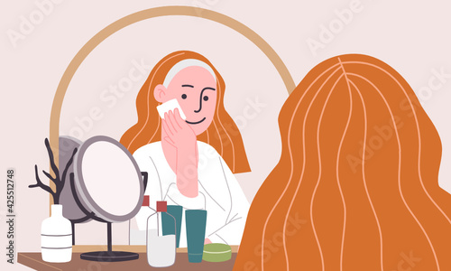 Flat style vector illustration of cartoon young woman character cleansing her face with cotton pad in front of mirror. Skin care routine. Wipe makeup off with makeup remover. daily life night routine.