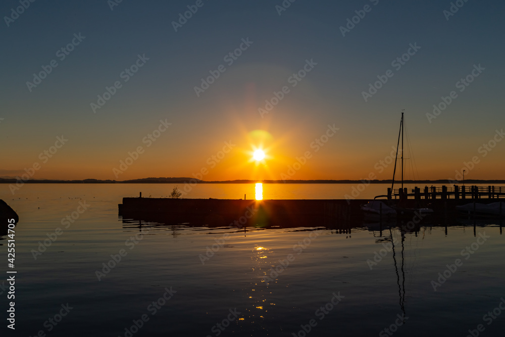 sunset over lake Chiemsee in the bavarian alps in Germany sunset over lake Chiemsee in the bavarian alps in Germany
