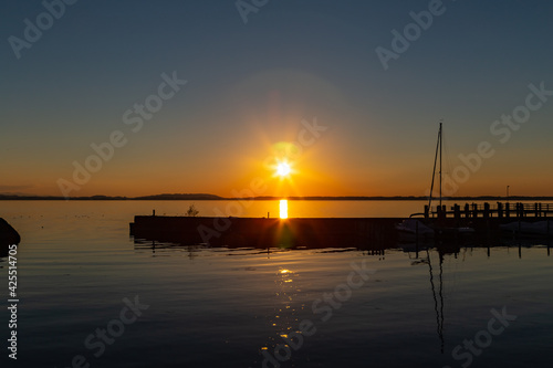 sunset over lake Chiemsee in the bavarian alps in Germany
