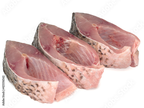 Carp steaks on white background, close up