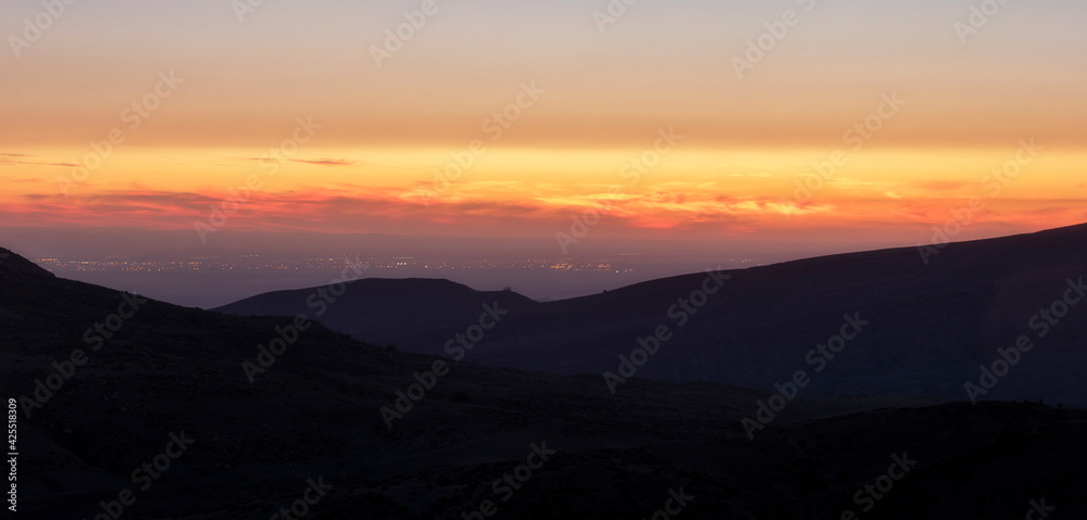 landscape in algeria and sunset sky with clouds . Beautiful moment the miracle of nature . sunset in the mountains of m'sila algeria
