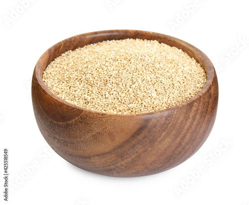 Wooden bowl with raw quinoa isolated on white