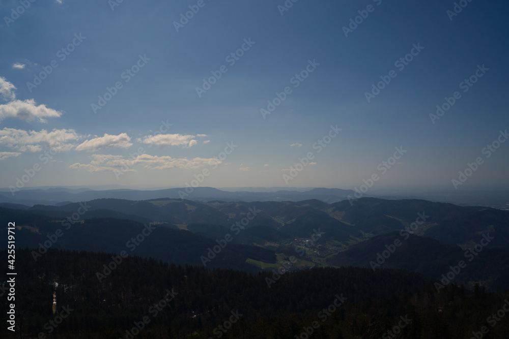 Obraz premium a beautiful view from a mountain with a great blue sky