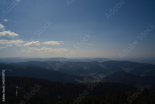 a beautiful view from a mountain with a great blue sky