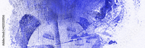Abstract panoramic blue background. Blue paint stains on the wall
