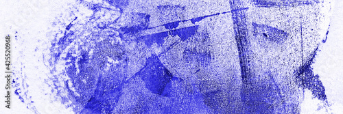 Abstract panoramic blue background. Blue paint stains on the wall