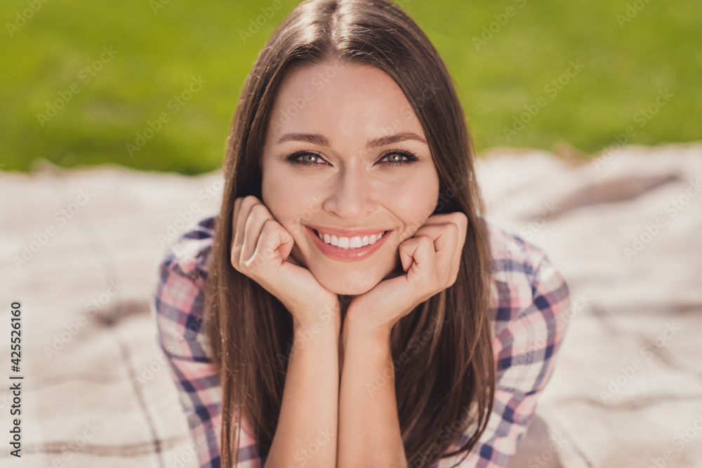 Photo of beaming smile nice young student woman hold hands cheekbones weekend enjoy outside in outdoors park Photo of beaming smile nice young student woman hold hands cheekbones weekend enjoy outside in outdoors park