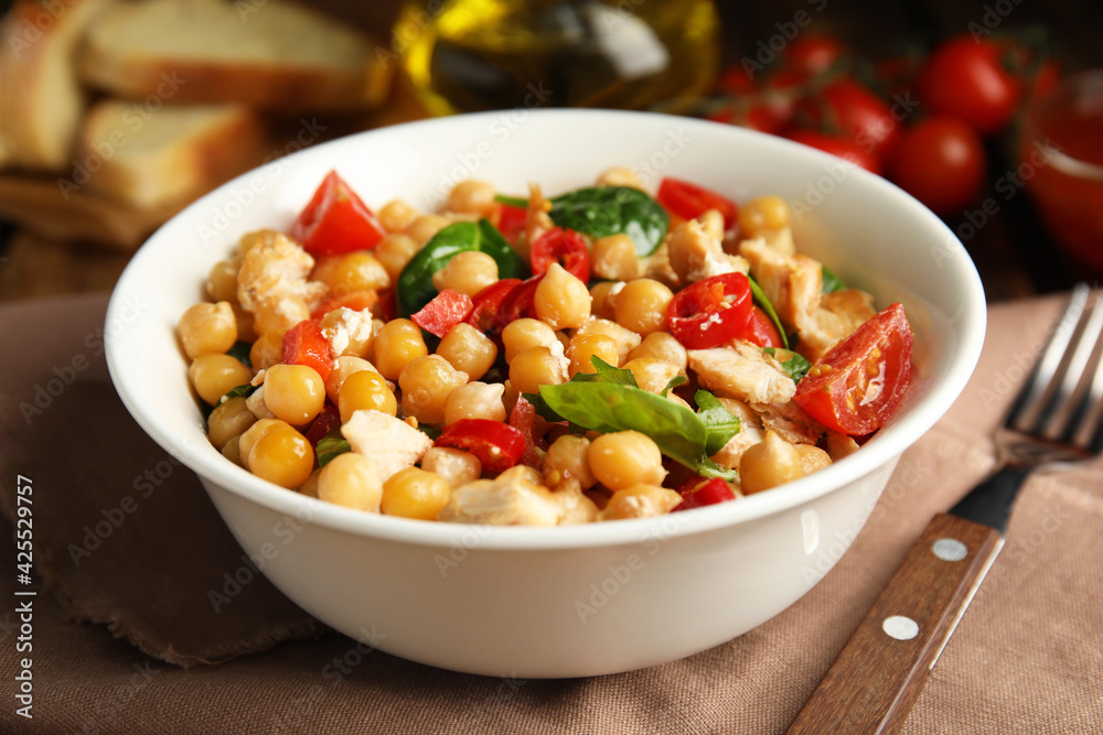 Delicious fresh chickpea salad served on table Delicious fresh chickpea salad served on table