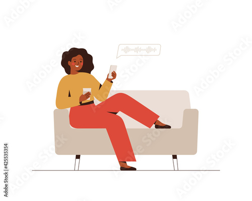 Black woman listens to audio podcast or voice message. Happy African female sits on the couch, drinks coffee and communicates by an chat with friends. Vector illustration