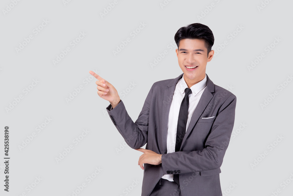 Portrait young asian business man pointing and presenting isolated on white background, advertising and marketing, executive and manager, male confident showing success, expression and emotion. Portrait young asian business man pointing and presenting isolated on white background, advertising and marketing, executive and manager, male confident showing success, expression and emotion.