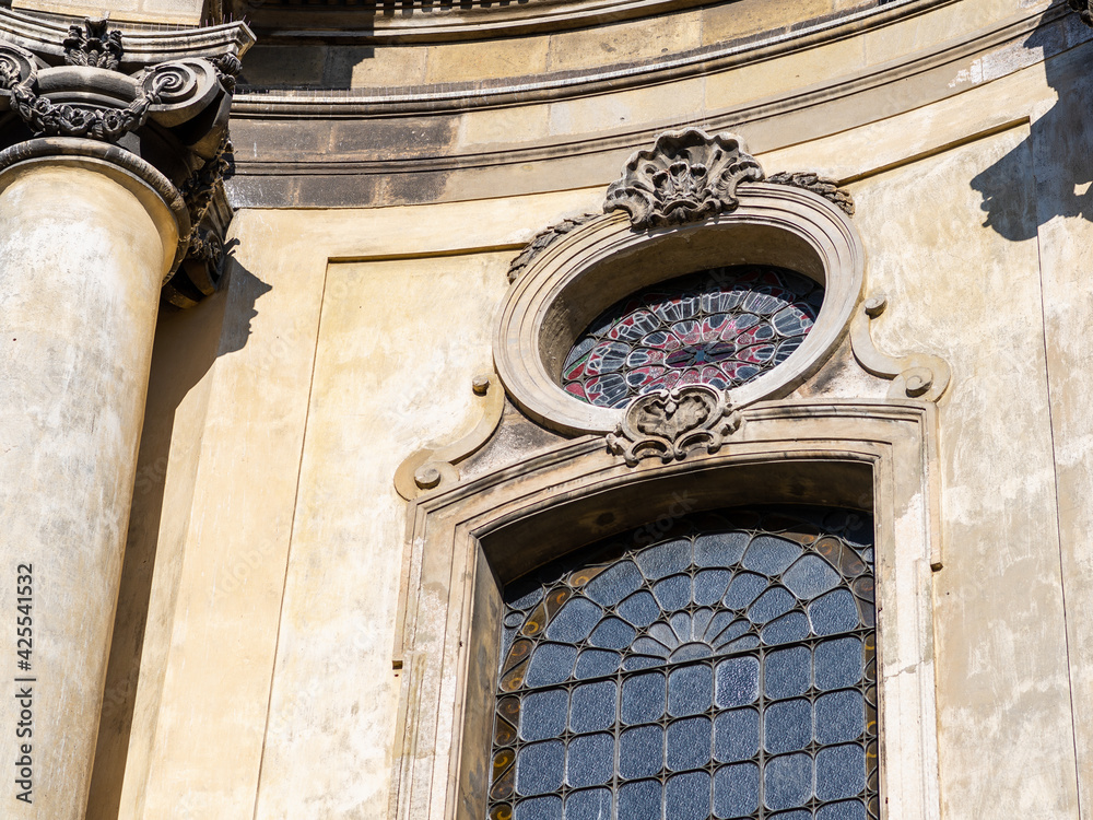 LVIV, UKRAINE - April, 2021: The Dominican church and monastery, window on the front of the church facade.