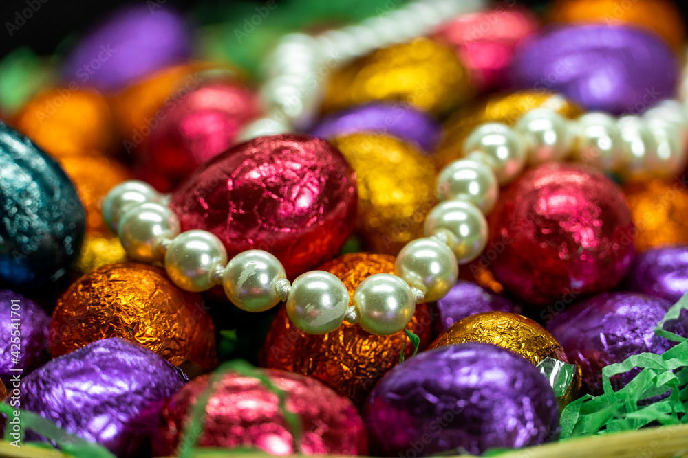 pearl jewellery and chocolate coloured candies pearl jewellery and chocolate coloured candies