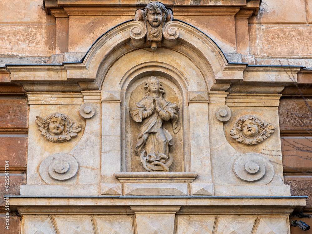 LVIV, UKRAINE - April, 2021: relief decoration on facade of ancient building in the old city.