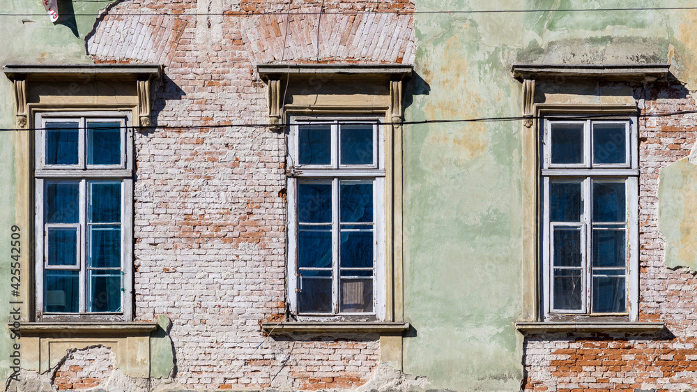 Old windows in an ancient building in Lviv, Ukraine.