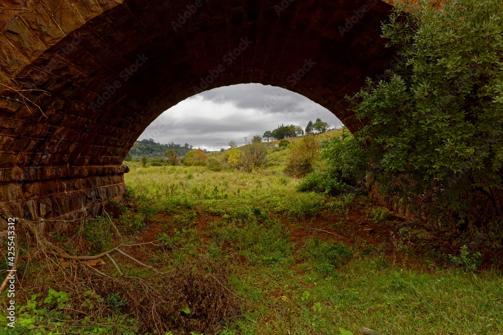 Scenery through arch at Joubert dolerite bridge across Blyde river, Pilgrims rest South Africa