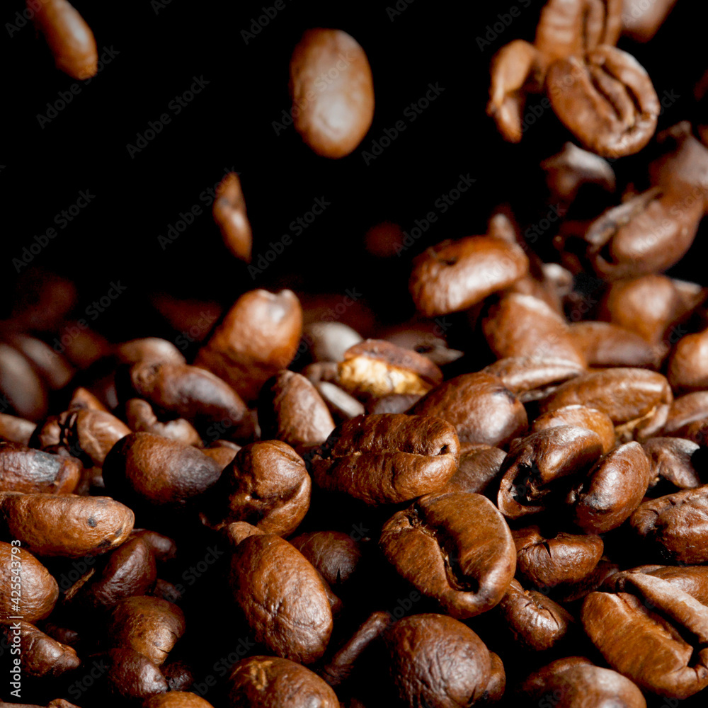 Fototapeta premium Coffee beans falling down