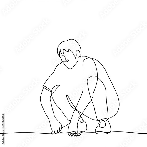 young man squatting wearily with his arms down - one line drawing vector.
