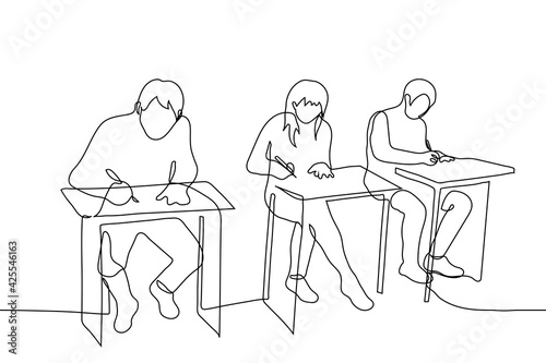 three students are sitting at their desks for the exam - one line drawing. offline learning concept, students adolescents without masks complete assignment or take lecture notes