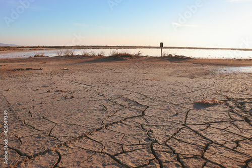 evaporated water leaving cracked earth and low water levels