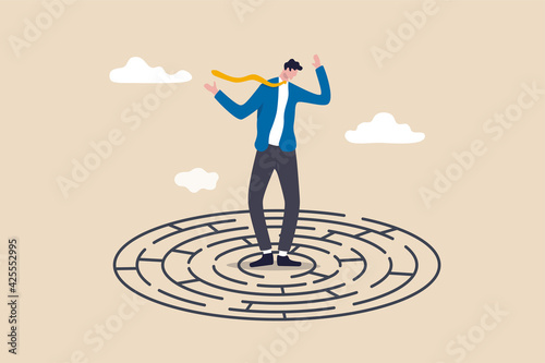Solving complex business problem, difficulty or challenge to overcome to achieve success or business direction concept, confused businessman in the middle of maze labyrinth finding exit or the way out