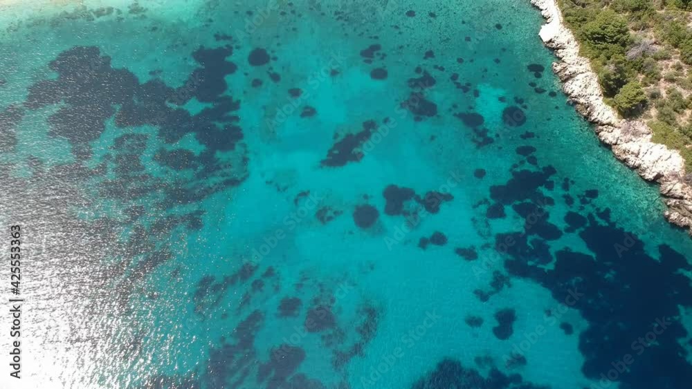Aerial view over the rocky beach Leftos Gialos in Alonissos island, Sporades, Greece Aerial view over the rocky beach Leftos Gialos in Alonissos island, Sporades, Greece