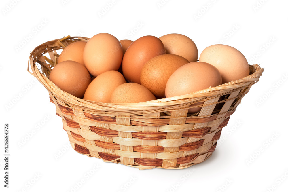 Chicken eggs in basket Isolated on white background. close up Chicken eggs in basket Isolated on white background. close up