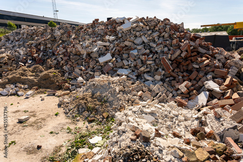 Loads of rubble at a landfill on a sunny summer day