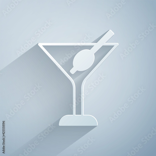 Paper cut Martini glass icon isolated on grey background. Cocktail icon. Wine glass icon. Paper art style. Vector