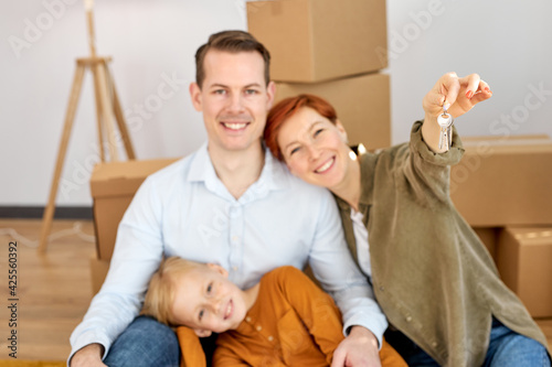 Excited Caucasian Young Family Show Keys To Own Home, Happy To Buy First House Together