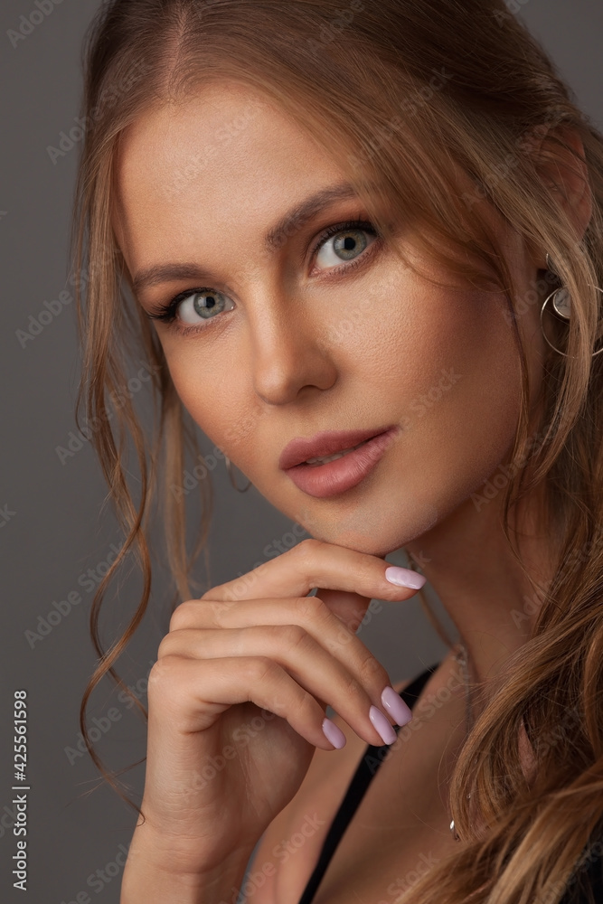 Portrait of a beautiful blonde with light skillful makeup Portrait of a beautiful blonde with light skillful makeup