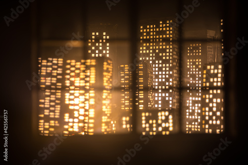 look through a window and city night view. Realistic dollhouse window and city miniature