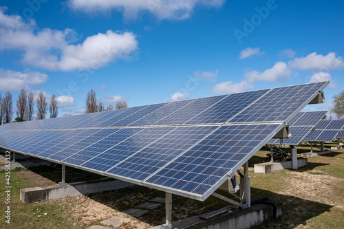 Solar energy power plant to prevent climate change. Solar panels under sunny sky