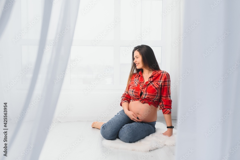 Portrait of the young pregnant woman Portrait of the young pregnant woman