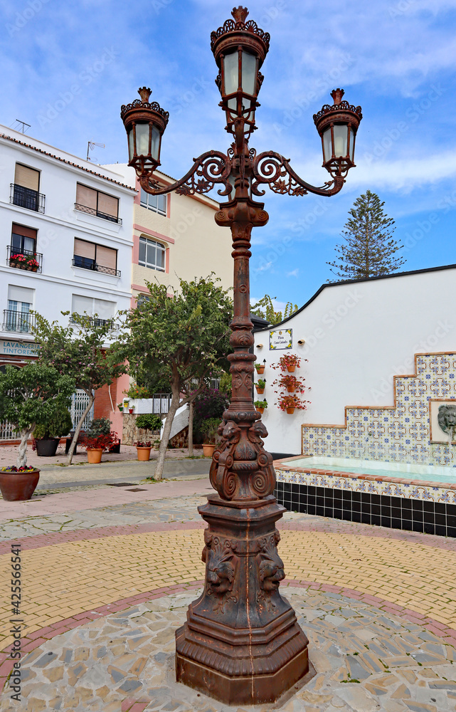 Ornate street lamp in a public plaza in Estepona in Spain