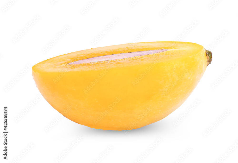 Sweet yellow marian plum cut in half isolated on white background.