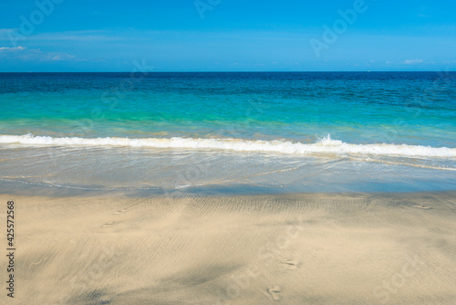 A White Sand beach (or Virgin Beach) on the southeast on Bali island in Indonesia on a sunny day