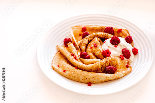 pancakes with jam and berries