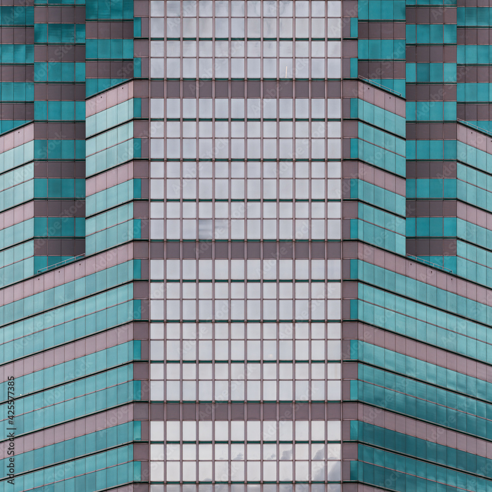 Geometric architectural abstract of colorful modern office building tower Geometric architectural abstract of colorful modern office building tower