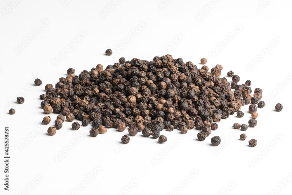 Black pepper seeds on white background Black pepper seeds on white background
