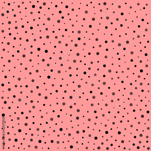 Seamless pattern with black dots, vector for fashion, wrapping paper, fabric, wallpaper and all prints on pink background