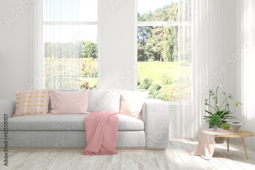 White living room with sofa and summer landscape in window. Scandinavian interior design. 3D illustration