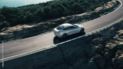 Electric car drive on the wind turbines background. Car drives along a mountain road. Electric car driving along windmills farm. Alternative energy for cars. Car and wind turbines farm. 3d animation