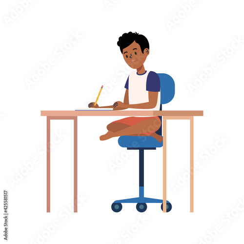 afro schoolboy writing