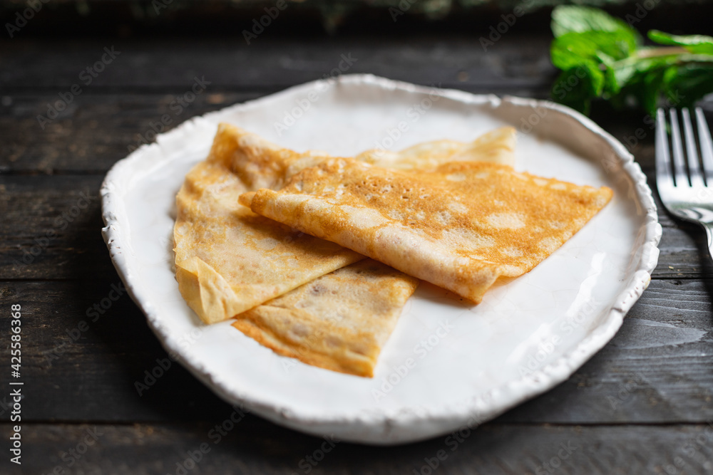 crepes sweet thin pancakes dessert flat cake snack healthy breakfast meal top view copy space for text food background rustic crepes sweet thin pancakes dessert flat cake snack healthy breakfast meal top view copy space for text food background rustic