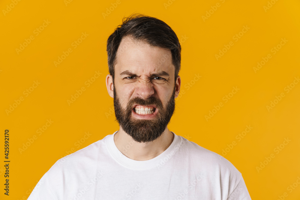 Portrait of an angry brunette bearded man Portrait of an angry brunette bearded man