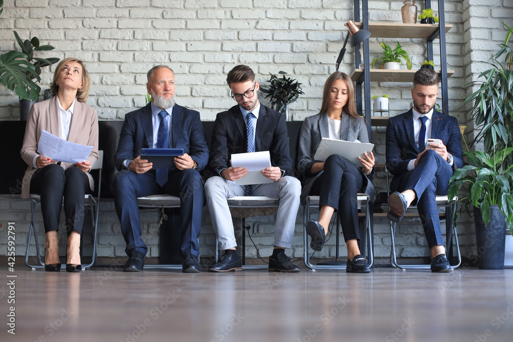 Modern business people waiting for job interview.