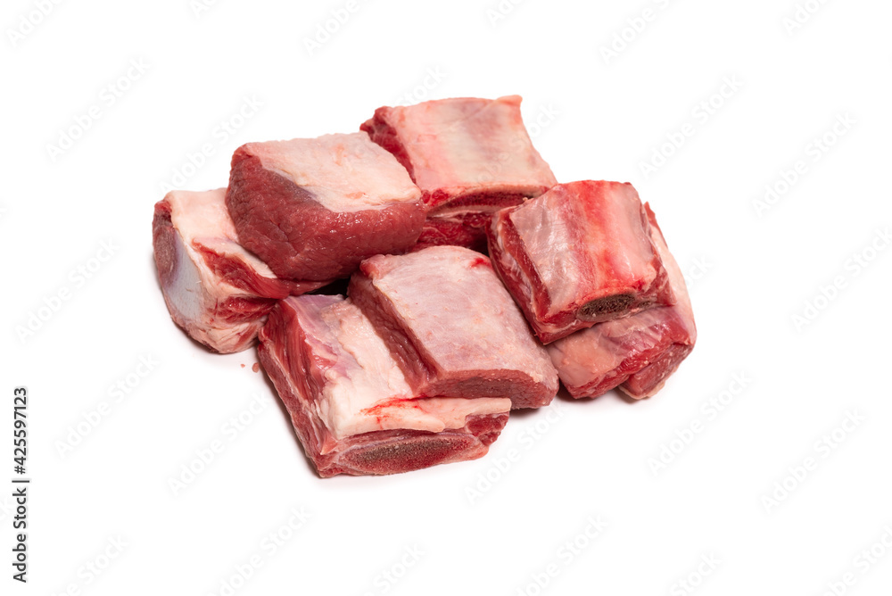 Raw beef ribs isolated on white background.