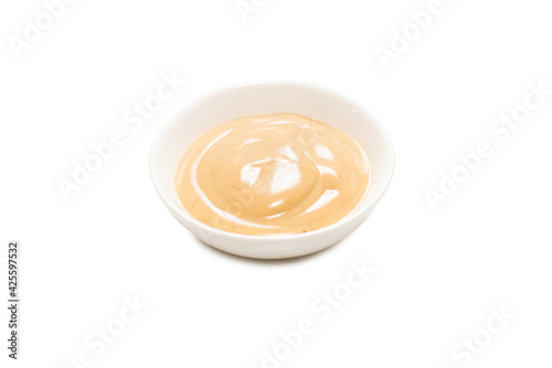 Mushroom sauce in a bowl isolated on white background.