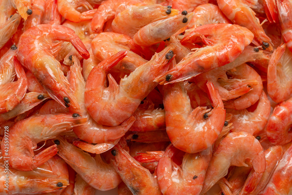 Shrimps background texture. A lot of shrimps. Cooked shrimps. Shrimps background texture. A lot of shrimps. Cooked shrimps.