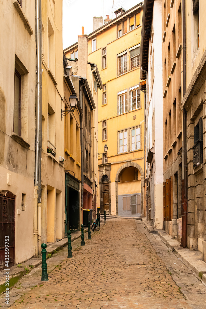 Lyon, typical street in the center, with colorful buildings

